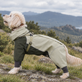 Full side view of olive green dog raincoat